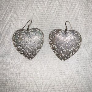 Heart shaped silver colored earrings